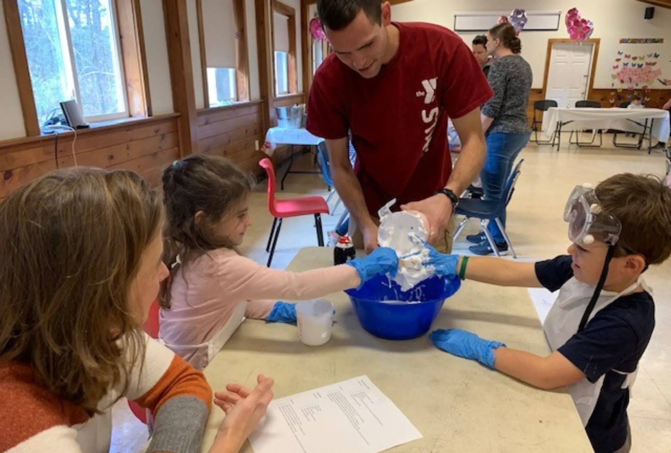 young kids making slime