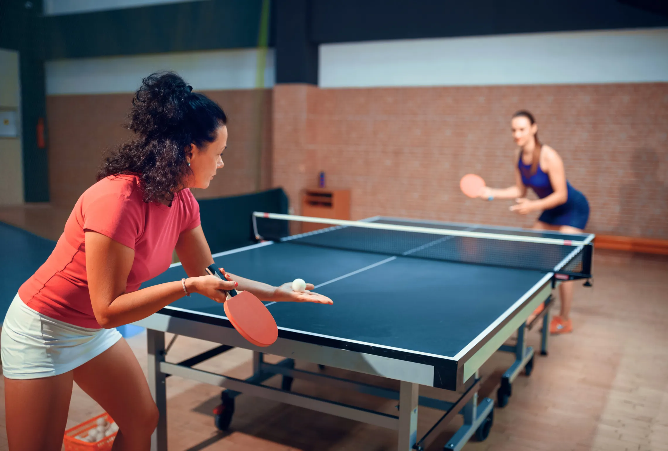 teens playing ping pong