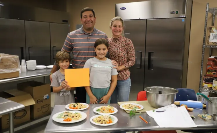 photo of family at cooking class