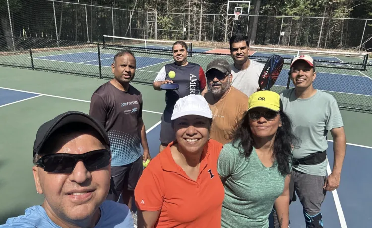 Pickleball players on our beautiful new outdoor courts