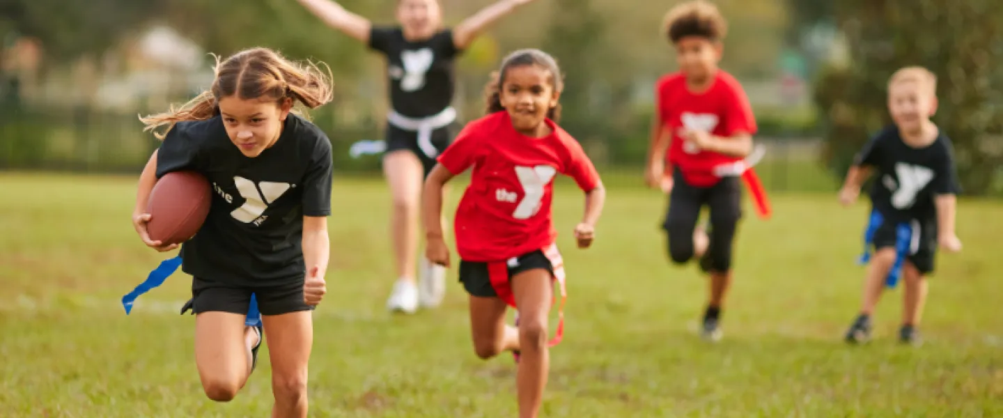 youth playing flag football