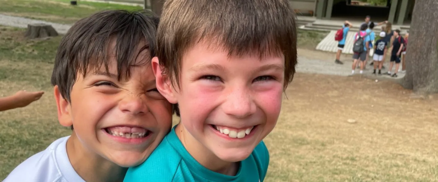 image of two boys smiling