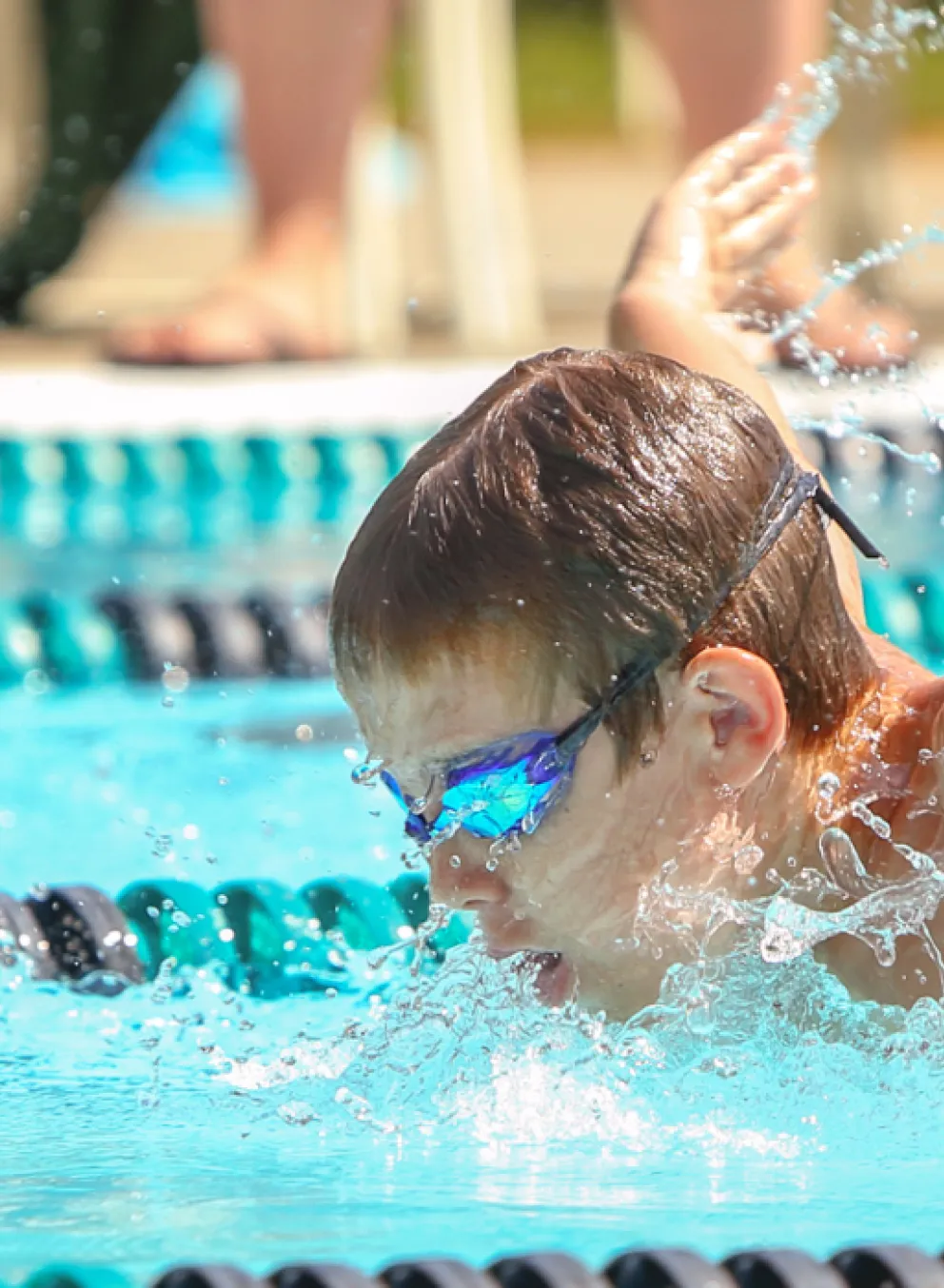 young boy swimming