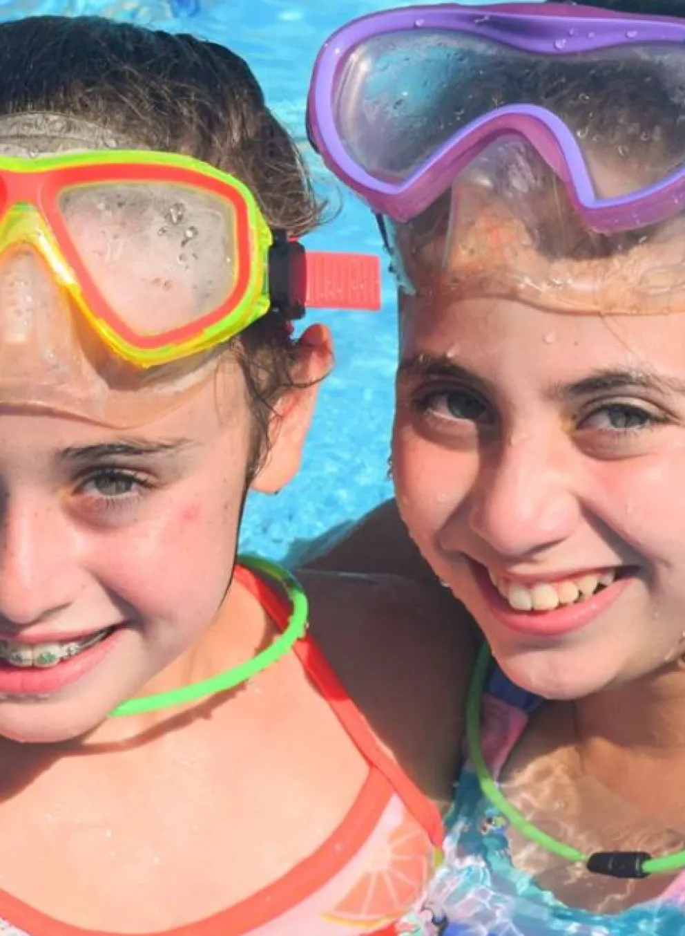 image of two girls in the pool