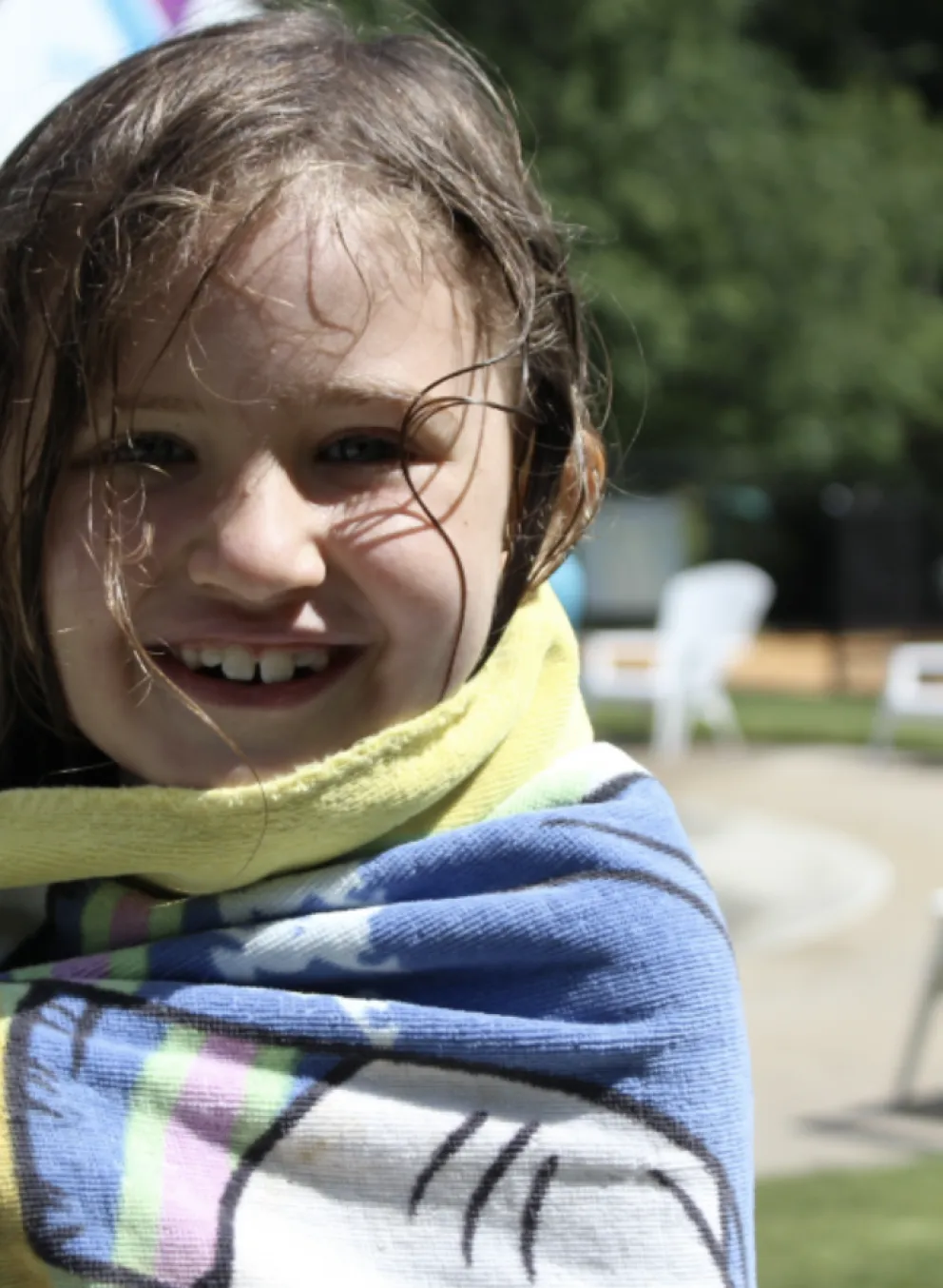 up close shot of young girl smiling at the camera