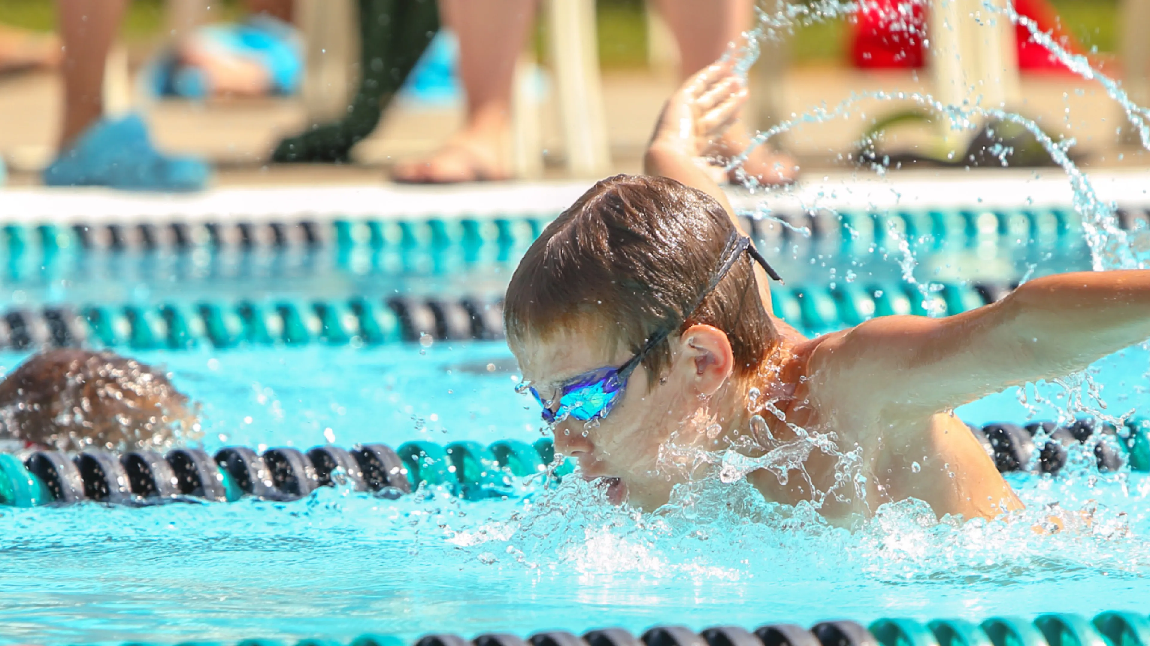 young boy swimming