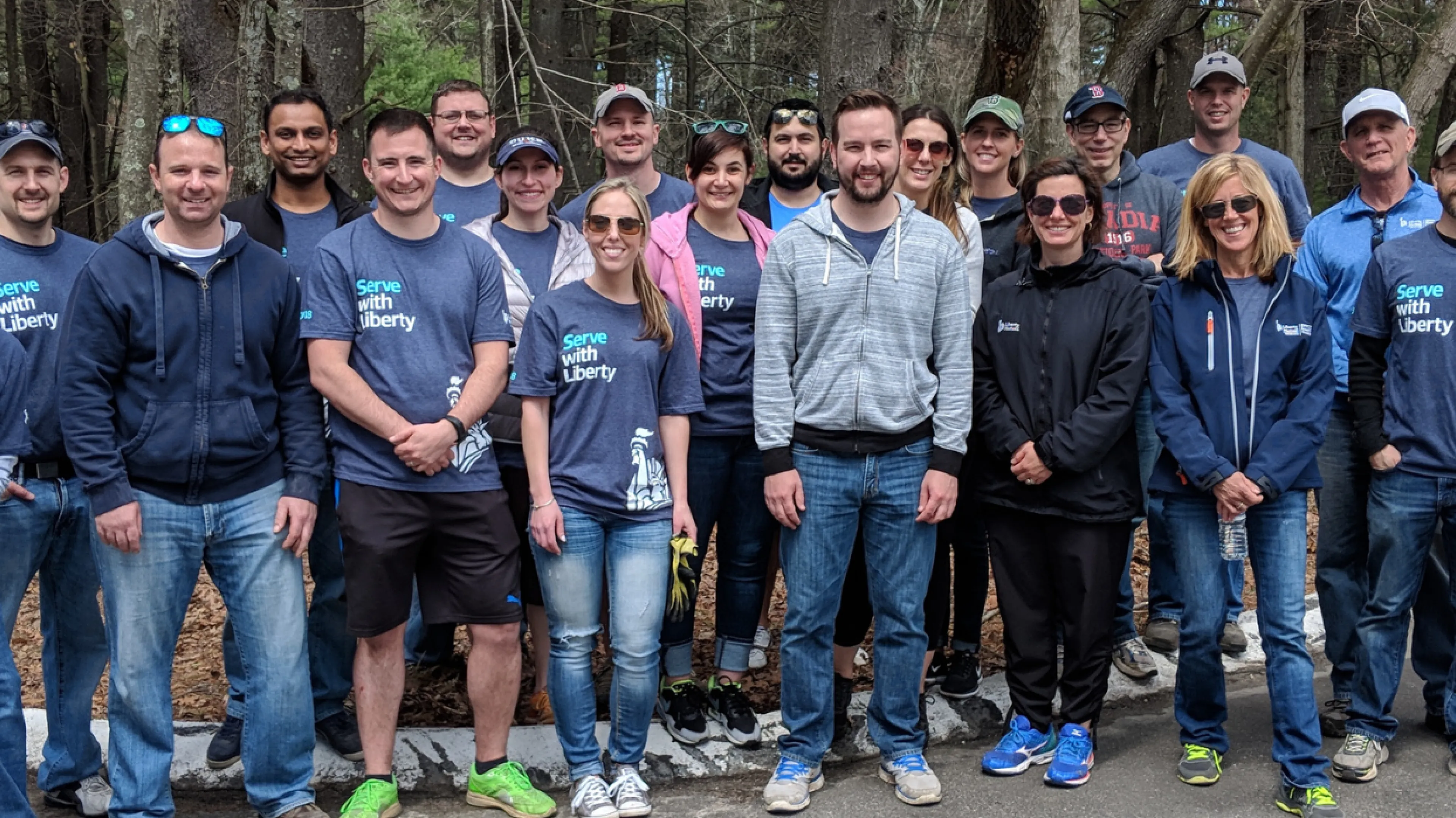 group of volunteers smiling together