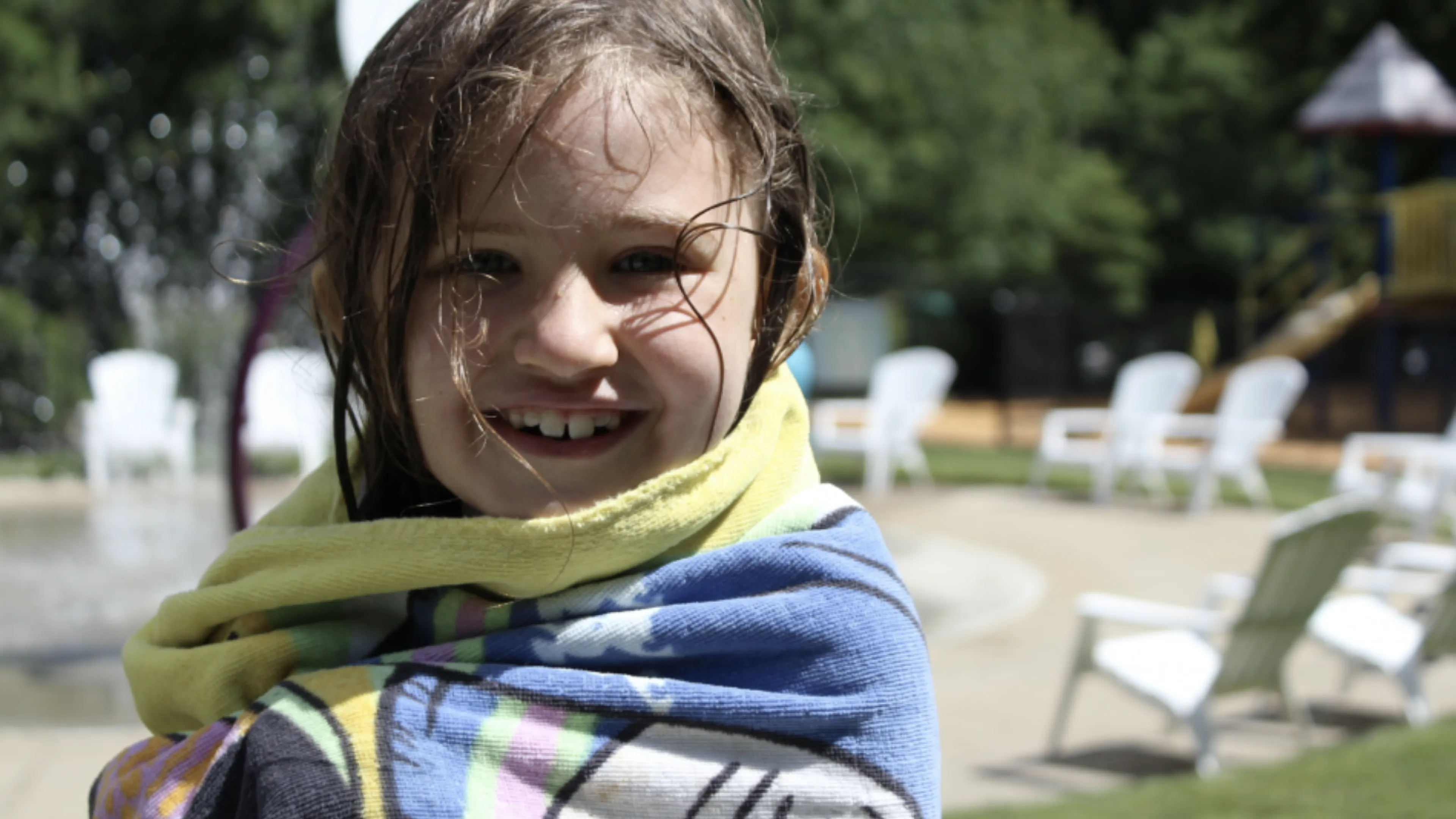up close shot of young girl smiling at the camera