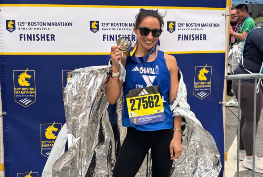 female runner posing at the Boston Marathon