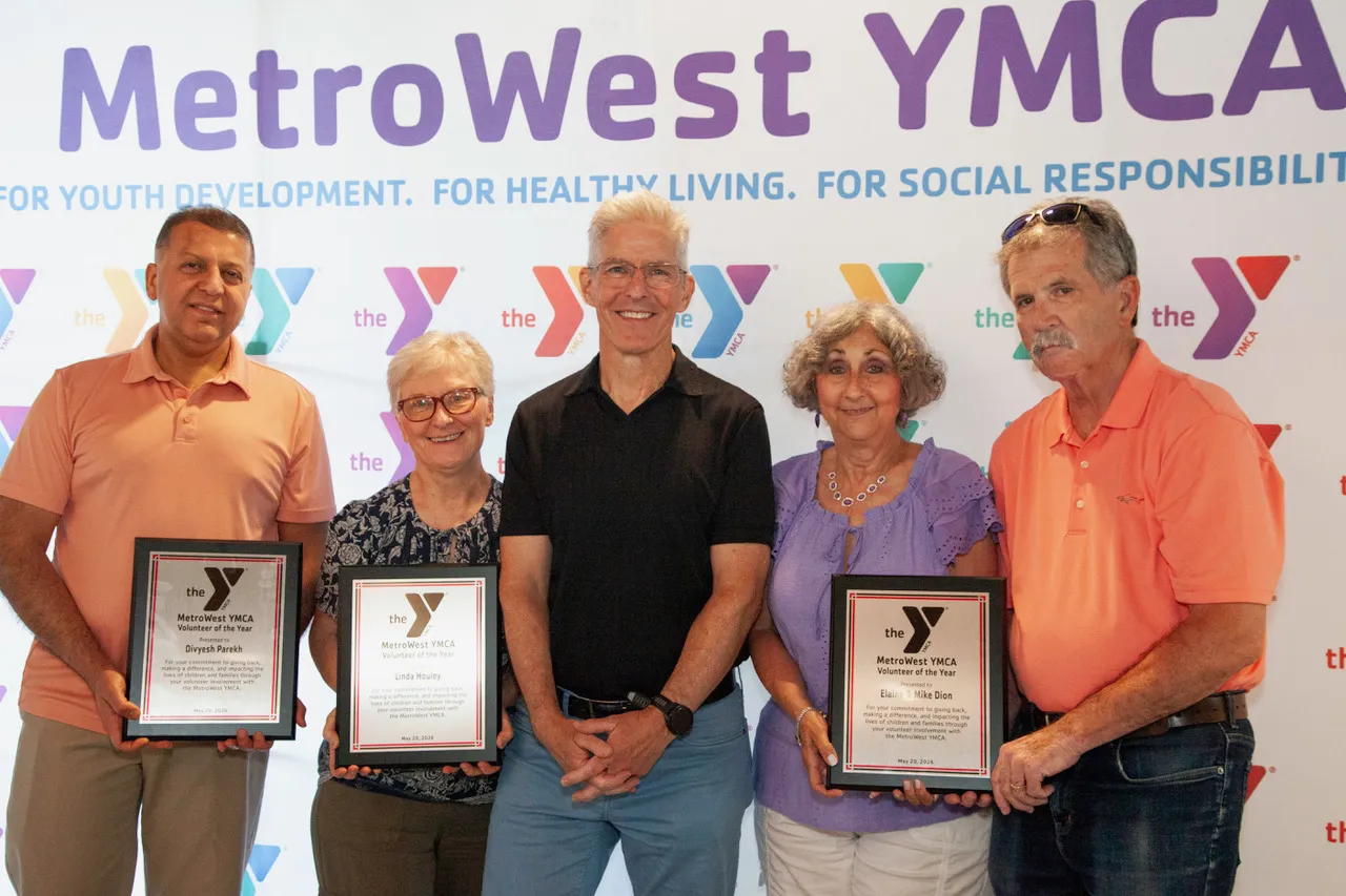 Distinguished Volunteers pose with Board Member, David O'Leary
