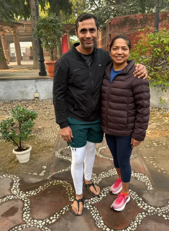 female runner with running coach