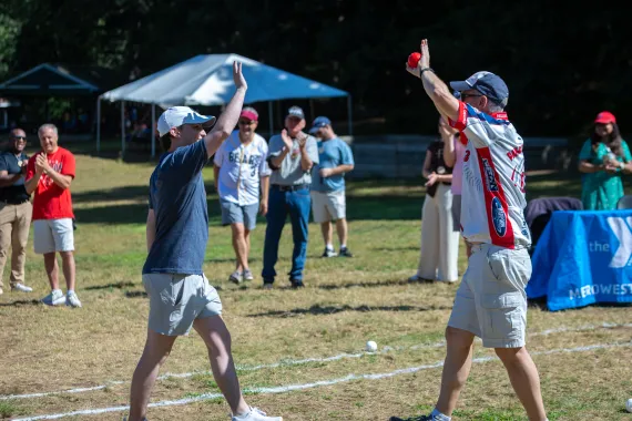 MetroWest YMCA leader and local community leader share a high five