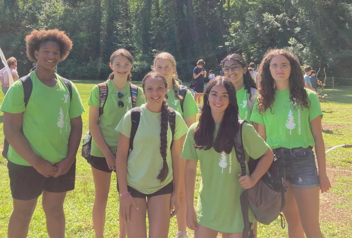 Counselors-in-training smile at a field day at Hopkinton Summer Camp