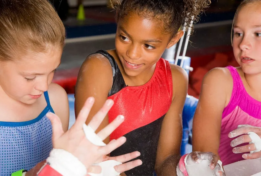 three girls at gymnastics
