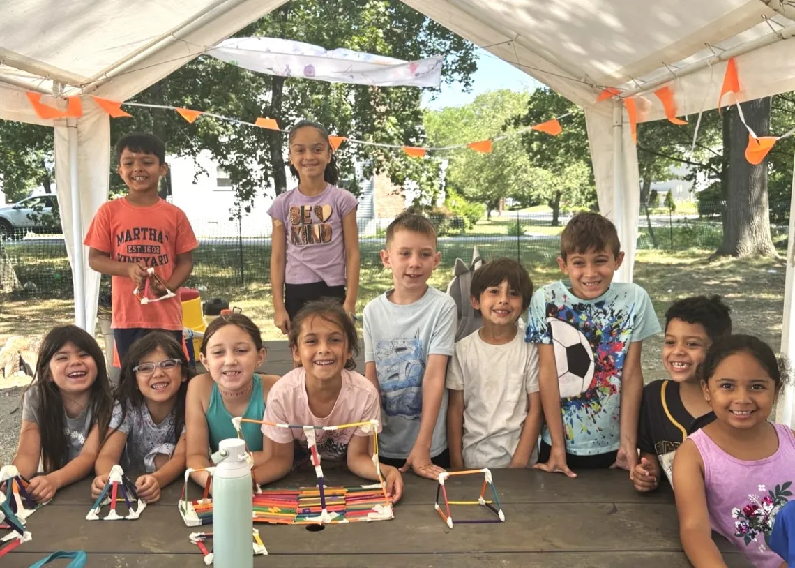 group of campers smiling at the camera