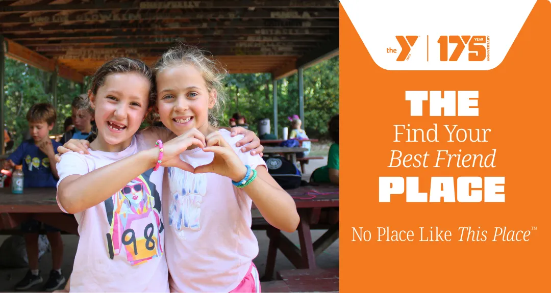 Two girls who met at summer camp pose smiling