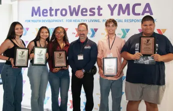 Youth Changemakers pose with Russ Hoyt