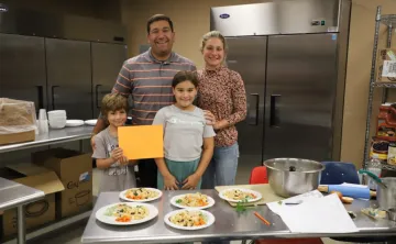 photo of family at cooking class