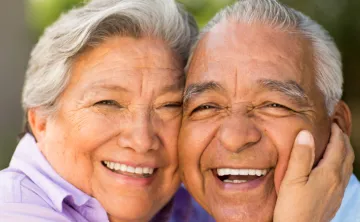 image of two seniors smiling