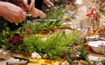 up close image of holiday wreath making