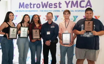 Youth Changemakers pose with Russ Hoyt