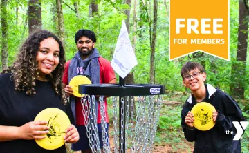 MetroWest YMCA teen members playing Disc Golf at Hopkinton Outdoor Center