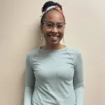 headshot of female camp staff