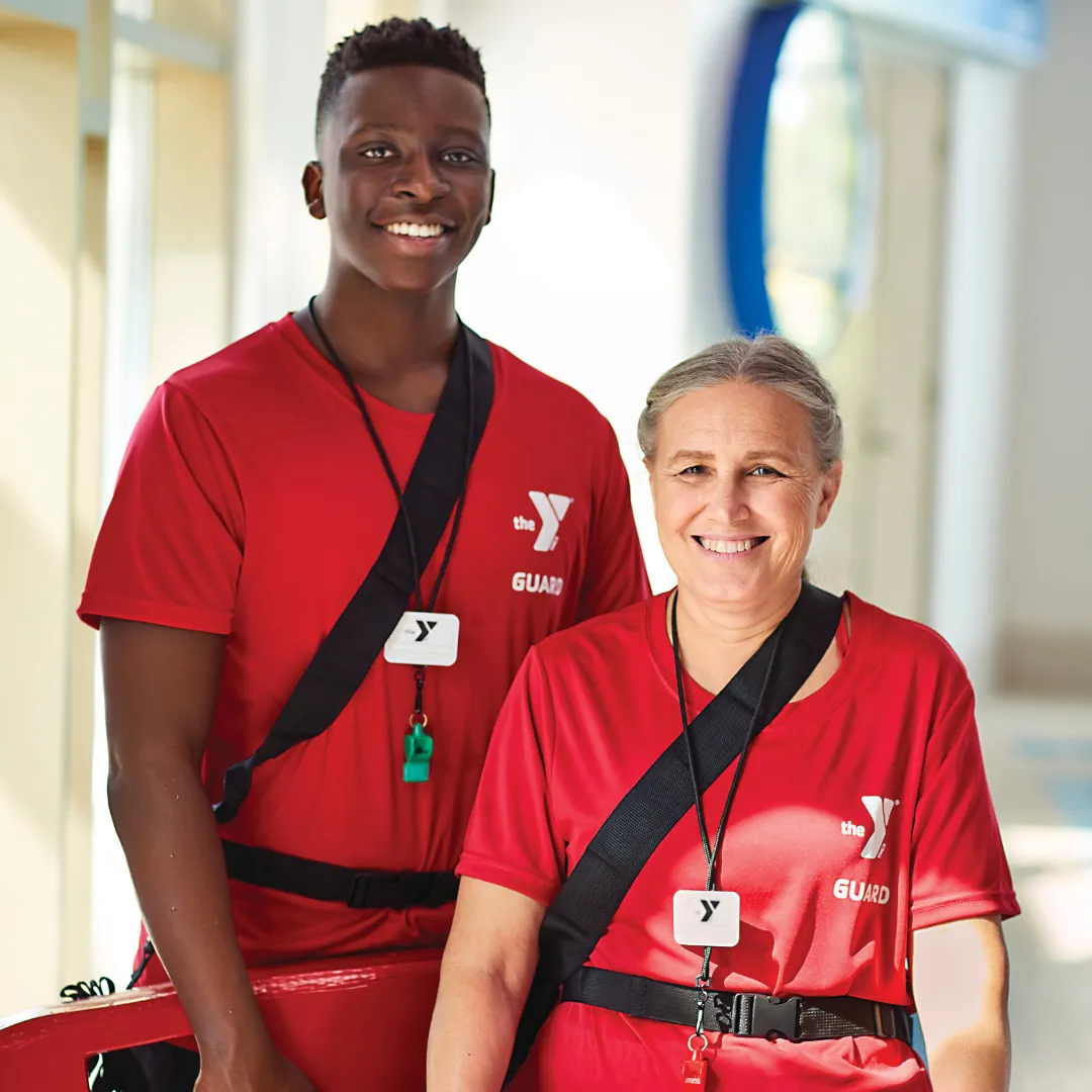 male and female lifeguards smiling