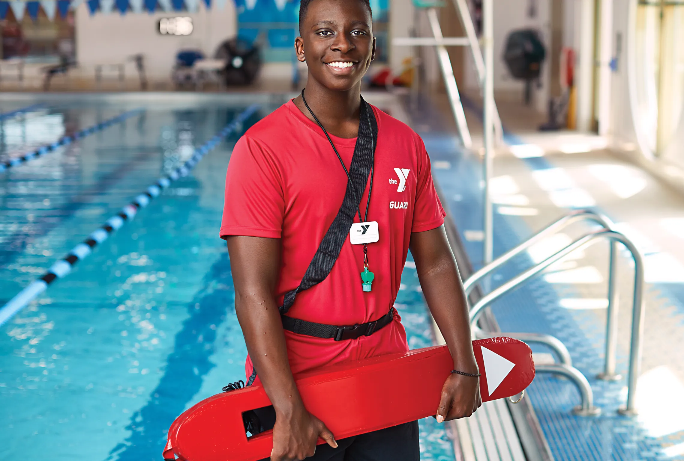 Young teen proudly completes lifeguard training